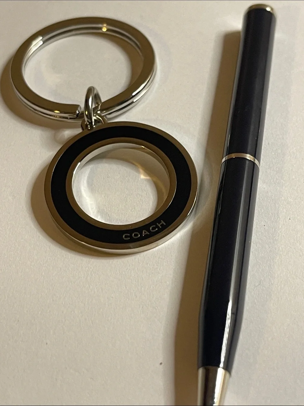 Coach Black & Silver Circular Keyring and Coach Pen